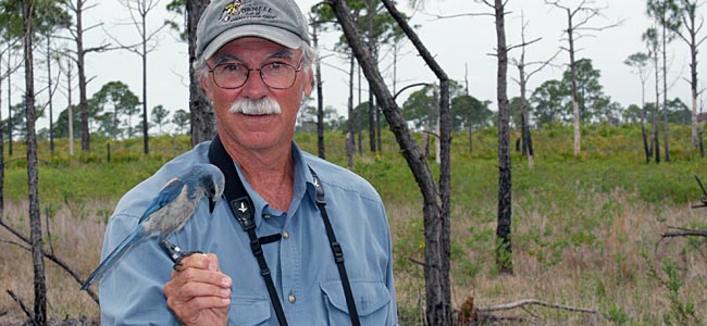 Cornell Lab director John Fitzpatrick with a Florida Scrub-Jay