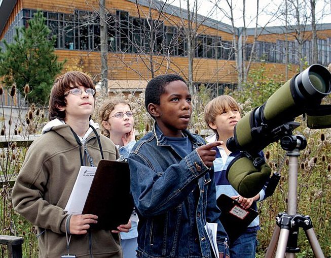 Young citizen scientists tally birds during a visit to the Lab of Ornithology. Photo by Susan Spear.