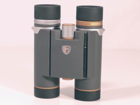 gray binoculars with orange highlights