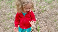 Persis Fen Fitzpatrick-Evans holds a red-backed salamander. Photo courtesy of Sarah Evans.