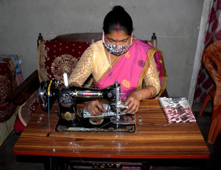 A stork motif is woven into traditional Assamese gamosas, cotton towels, made by members of the hargila army. Photo by Dhiraj Das.